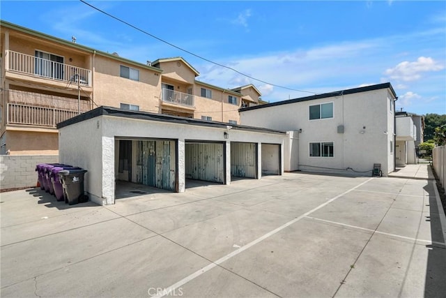 1075 Molino Ave Unit D, Long Beach, CA 90804 - back of property featuring stucco siding and fence