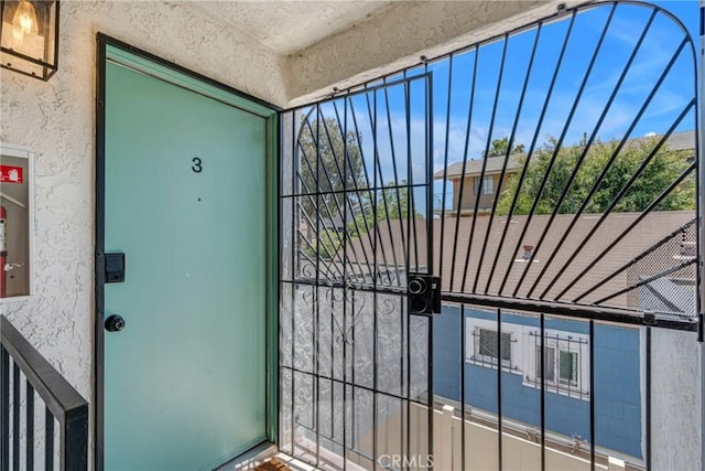 1075 Molino Ave Unit D, Long Beach, CA 90804 - doorway to property with stucco siding