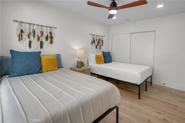 1075 Molino Ave Unit D, Long Beach, CA 90804 - bedroom with light wood-style floors, recessed lighting, a closet, baseboards, and ceiling fan
