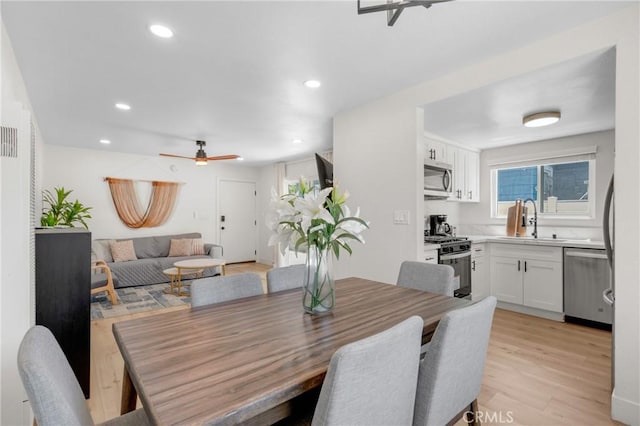 1075 Molino Ave Unit D, Long Beach, CA 90804 - dining area with a ceiling fan, light wood-style floors, and recessed lighting
