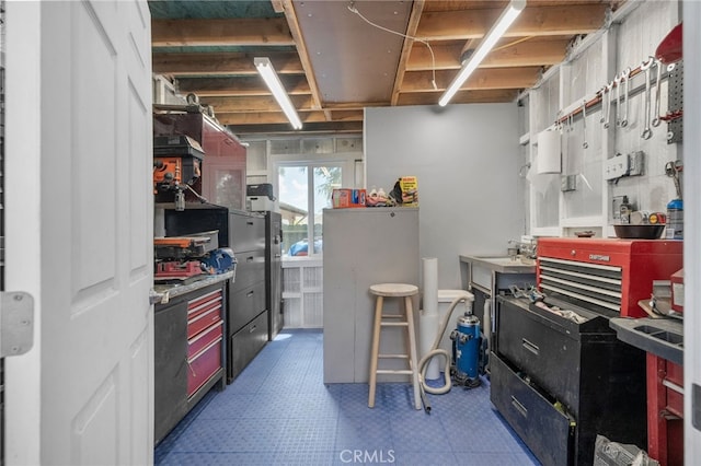2137 N Murray St, Banning, CA 92220 - below grade area with a workshop area and tile patterned floors