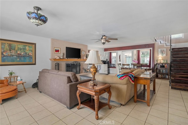 2137 N Murray St, Banning, CA 92220 - living area featuring stairway, ceiling fan, and light tile patterned flooring