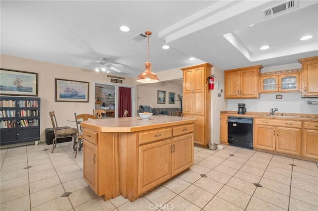 2137 N Murray St, Banning, CA 92220 - kitchen featuring dishwasher, a sink, recessed lighting, light tile patterned floors, and light countertops