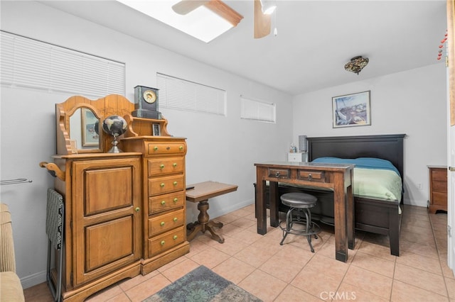 2137 N Murray St, Banning, CA 92220 - bedroom featuring light tile patterned floors, a ceiling fan, and baseboards
