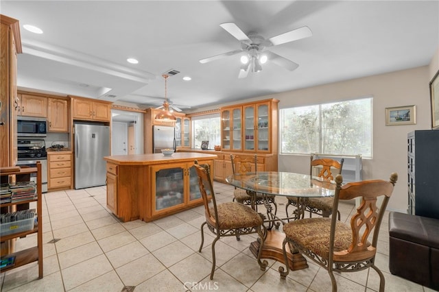 2137 N Murray St, Banning, CA 92220 - dining space with a ceiling fan, light tile patterned floors, and recessed lighting
