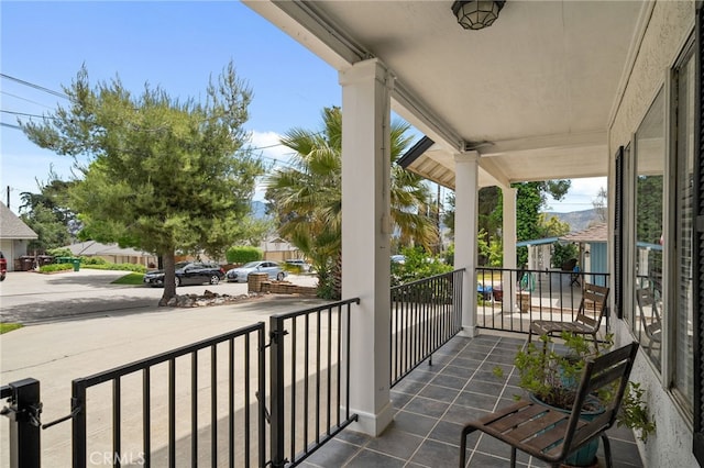 2137 N Murray St, Banning, CA 92220 - balcony featuring a porch