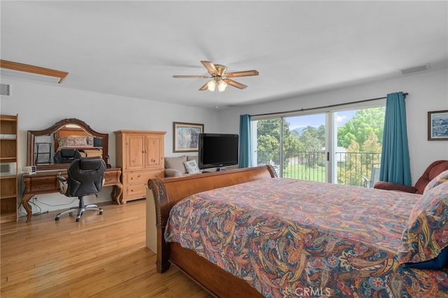 2137 N Murray St, Banning, CA 92220 - bedroom with access to exterior, light wood-type flooring, and a ceiling fan