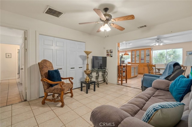 2137 N Murray St, Banning, CA 92220 - living area with light tile patterned floors and a ceiling fan
