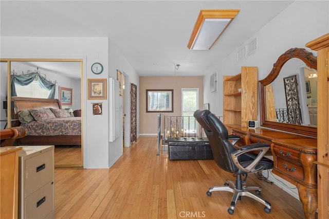 2137 N Murray St, Banning, CA 92220 - office area featuring light wood-type flooring and baseboards