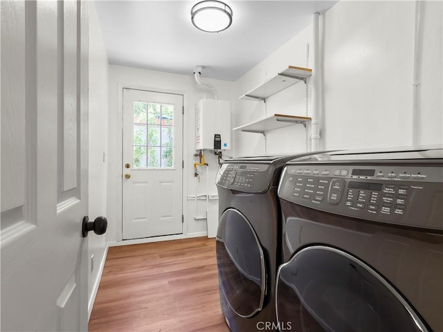 3627 Virginia St, La Crescenta, CA 91214 - washroom with water heater, washer and dryer, and wood finished floors