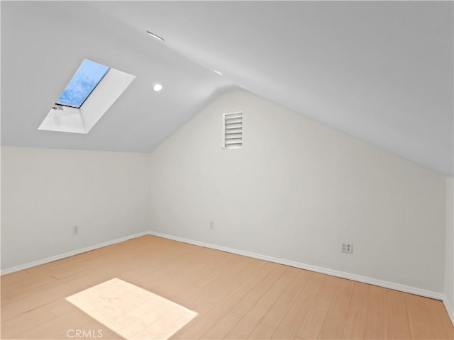 3627 Virginia St, La Crescenta, CA 91214 - bonus room with a skylight, wood finished floors, lofted ceiling, and baseboards