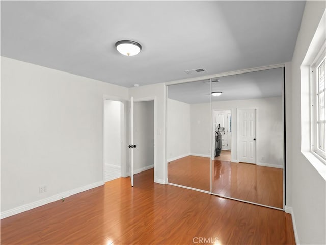 3627 Virginia St, La Crescenta, CA 91214 - unfurnished bedroom with wood finished floors, baseboards, and a closet