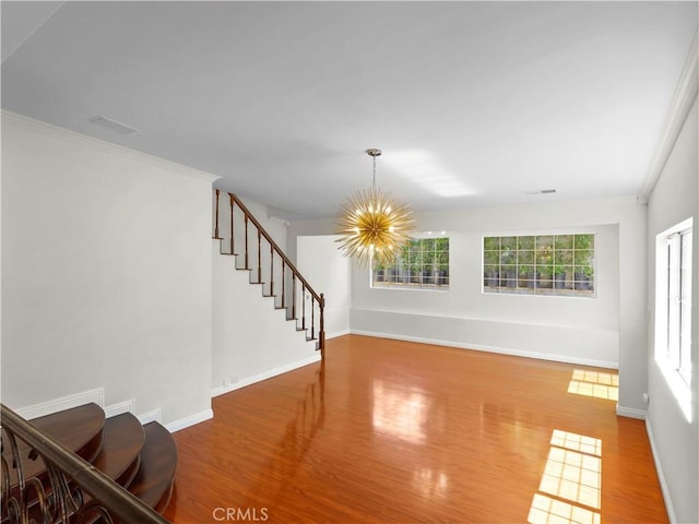 3627 Virginia St, La Crescenta, CA 91214 - unfurnished living room featuring a chandelier, wood finished floors, stairs, and baseboards