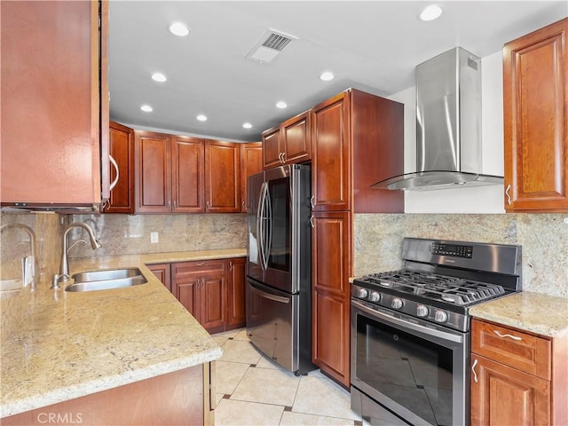 3627 Virginia St, La Crescenta, CA 91214 - kitchen featuring stainless steel appliances, wall chimney range hood, a sink, light stone counters, and decorative backsplash