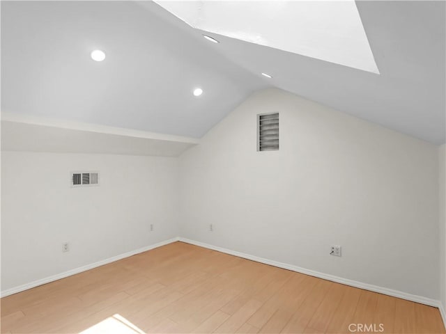 3627 Virginia St, La Crescenta, CA 91214 - additional living space featuring vaulted ceiling, wood finished floors, recessed lighting, baseboards, and a skylight