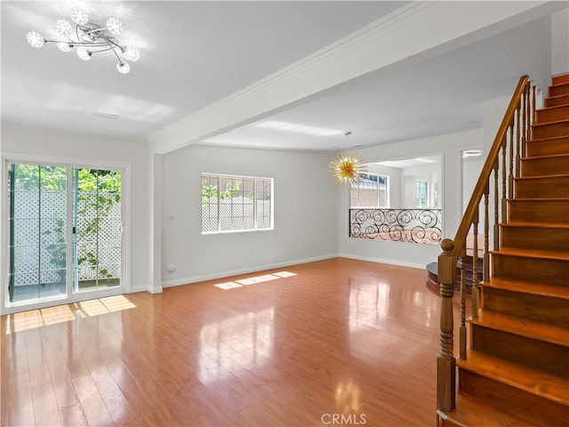 3627 Virginia St, La Crescenta, CA 91214 - unfurnished living room with a chandelier, baseboards, stairway, wood finished floors, and beamed ceiling