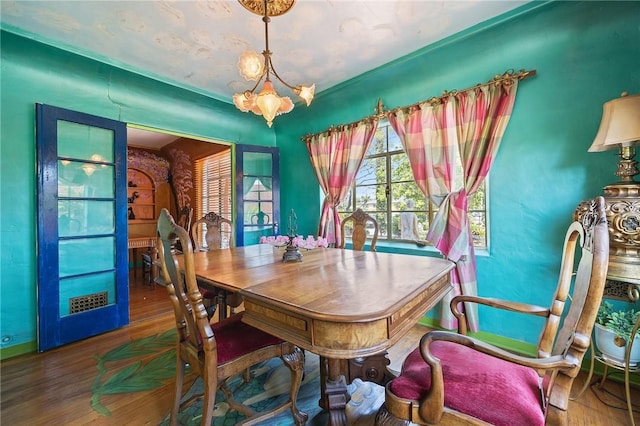 720 W La Habra Blvd, La Habra, CA 90631 - dining space with wood finished floors, a chandelier, and baseboards