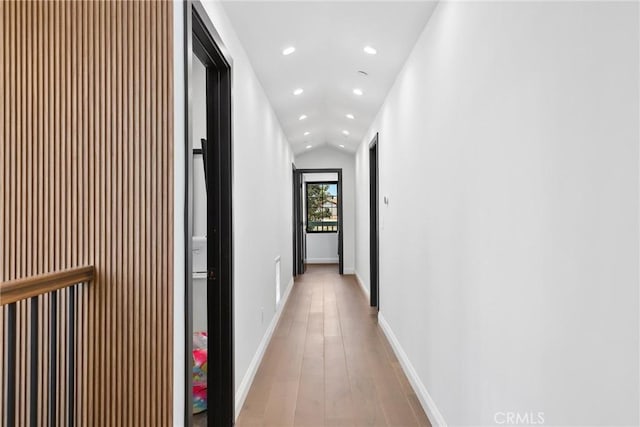 535 N Sierra Bonita Ave, Los Angeles, CA 90036 - hallway featuring recessed lighting, light wood-style floors, baseboards, and vaulted ceiling