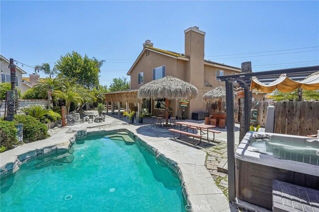 3723 Pinto Pl, Ontario, CA 91761 - view of swimming pool with a hot tub, a patio area, and fence