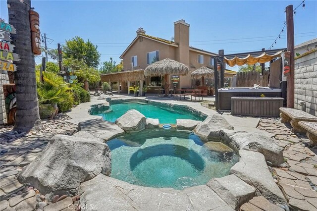 3723 Pinto Pl, Ontario, CA 91761 - outdoor pool with an in-ground hot tub, a patio, and fence
