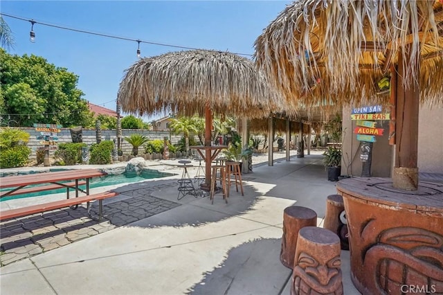 3723 Pinto Pl, Ontario, CA 91761 - view of community featuring a pool, a patio area, and fence