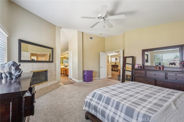 3723 Pinto Pl, Ontario, CA 91761 - bedroom with carpet flooring, a fireplace, baseboards, ensuite bath, and a ceiling fan