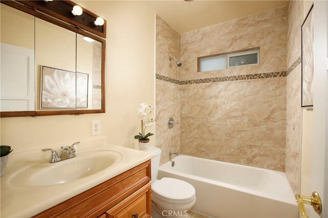 10345 Sherman Grove Ave, Sunland, CA 91040 - bathroom with bathtub / shower combination, toilet, and vanity