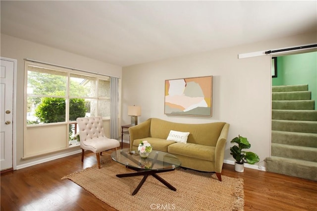 10345 Sherman Grove Ave, Sunland, CA 91040 - living room with stairway, wood finished floors, and baseboards