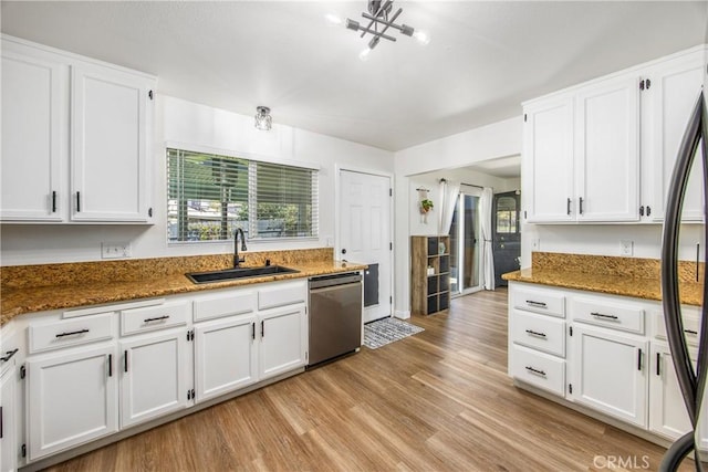 1388 E 39th St, San Bernardino, CA 92404 - kitchen featuring a sink, stainless steel appliances, white cabinets, and dark stone countertops