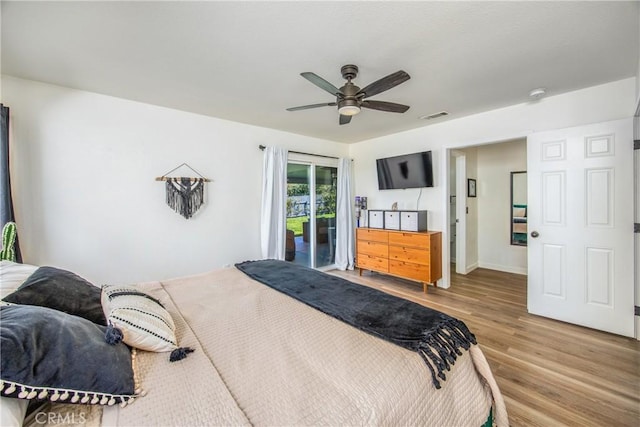 1388 E 39th St, San Bernardino, CA 92404 - bedroom with wood finished floors, access to exterior, ceiling fan, and baseboards