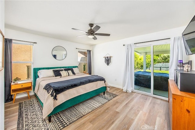 1388 E 39th St, San Bernardino, CA 92404 - bedroom with access to exterior, light wood-type flooring, ceiling fan, and baseboards