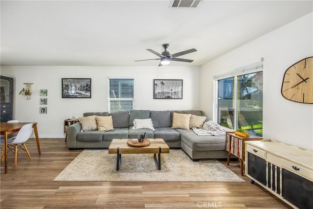 1388 E 39th St, San Bernardino, CA 92404 - living room with wood finished floors and a ceiling fan