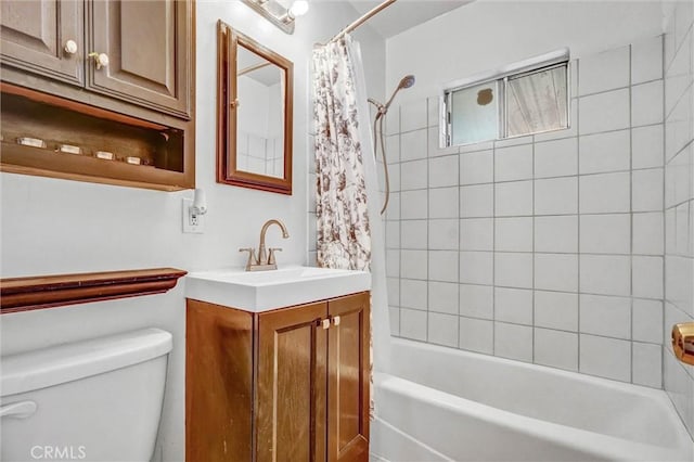 full bathroom with toilet, shower / bath combination with curtain, and vanity