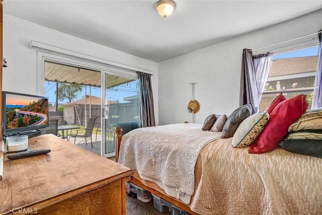 bedroom with access to outside