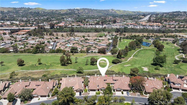 27345 Via Capri, San Juan Capistrano, CA 92675 - aerial view of property and surrounding area featuring nearby suburban area, a local golf course, and a water and mountain view