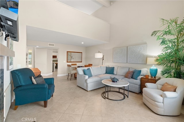 27345 Via Capri, San Juan Capistrano, CA 92675 - living room featuring light tile patterned flooring, a high ceiling, and beam ceiling