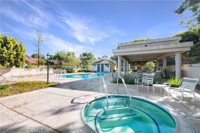 27345 Via Capri, San Juan Capistrano, CA 92675 - community pool featuring a community hot tub and a patio area