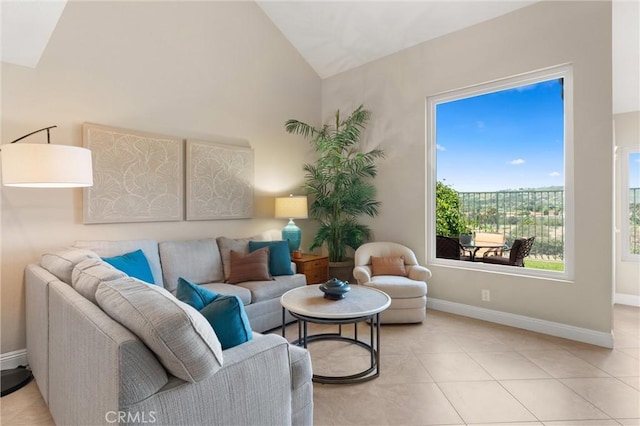 27345 Via Capri, San Juan Capistrano, CA 92675 - living area with vaulted ceiling, baseboards, and light tile patterned floors