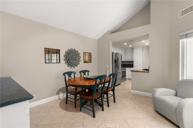 27345 Via Capri, San Juan Capistrano, CA 92675 - dining space featuring light tile patterned floors, baseboards, high vaulted ceiling, and recessed lighting