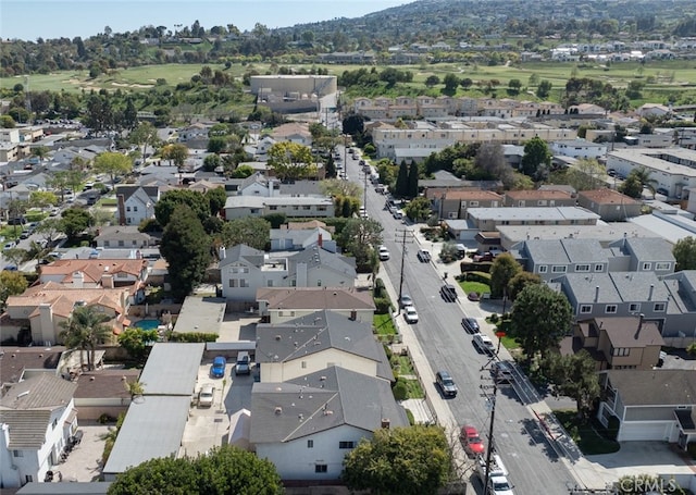 aerial perspective of suburban area featuring a mountainous background