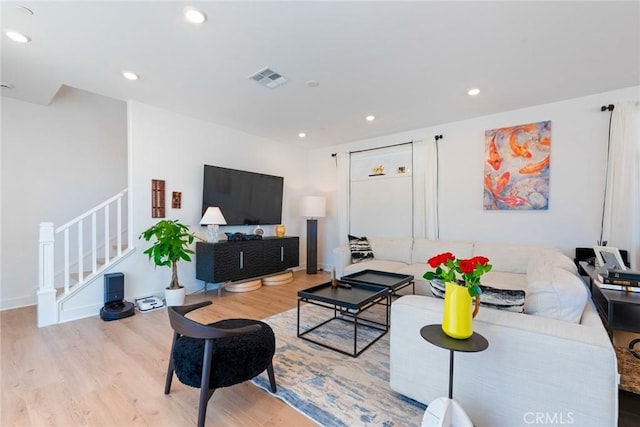188 Merit, Irvine, CA 92618 - living room featuring wood finished floors, stairs, and recessed lighting