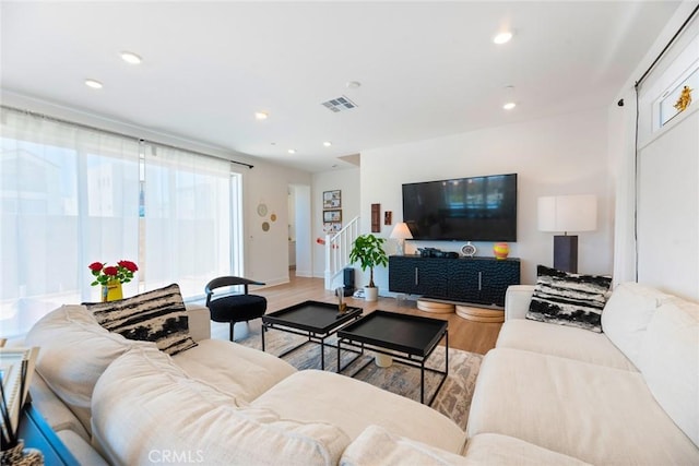 188 Merit, Irvine, CA 92618 - living room featuring wood finished floors, recessed lighting, stairs, and baseboards