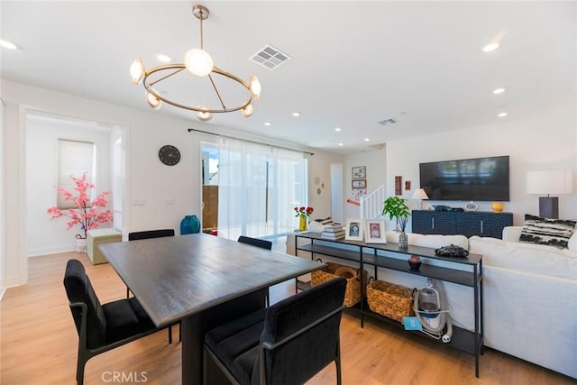 188 Merit, Irvine, CA 92618 - kitchen featuring recessed lighting, light wood-type flooring, a chandelier, baseboards, and decorative light fixtures