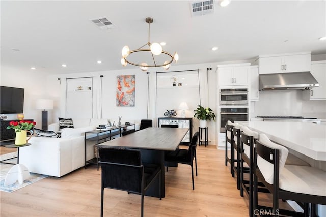 188 Merit, Irvine, CA 92618 - dining room featuring a chandelier, light wood-type flooring, and recessed lighting