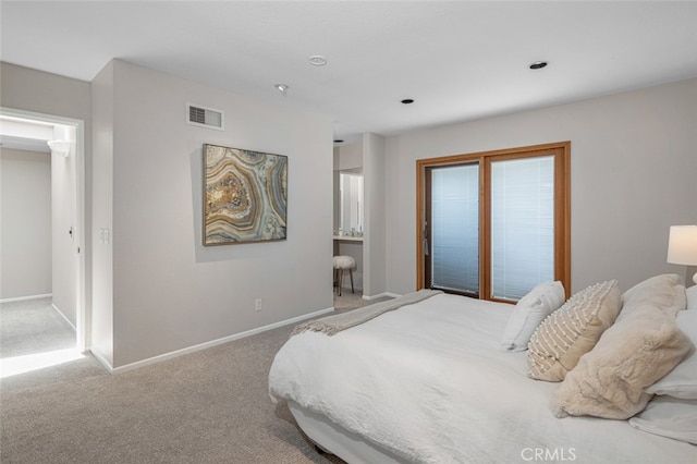 bedroom featuring carpet flooring and baseboards