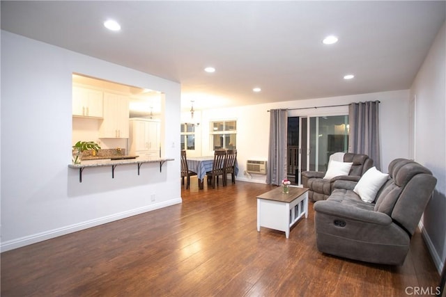 2852 Sawtelle Blvd Unit 41, Los Angeles, CA 90064 - living room with dark wood-style floors, recessed lighting, a wall unit AC, baseboards, and a chandelier