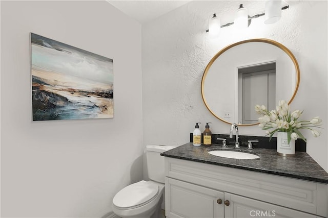 half bath with toilet and vanity