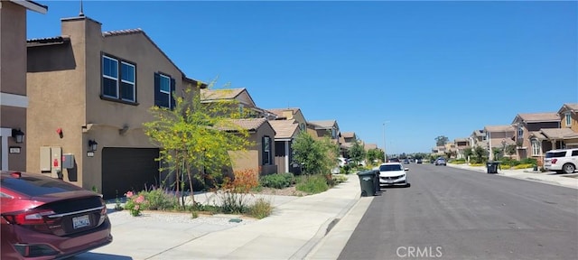 833 Half Moon Ave, Redlands, CA 92374 - view of asphalt street with sidewalks, a residential view, and curbs