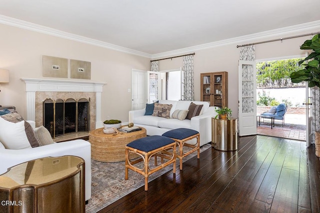 741 Burleigh Dr, Pasadena, CA 91105 - living area with dark wood-style flooring, ornamental molding, and a tiled fireplace