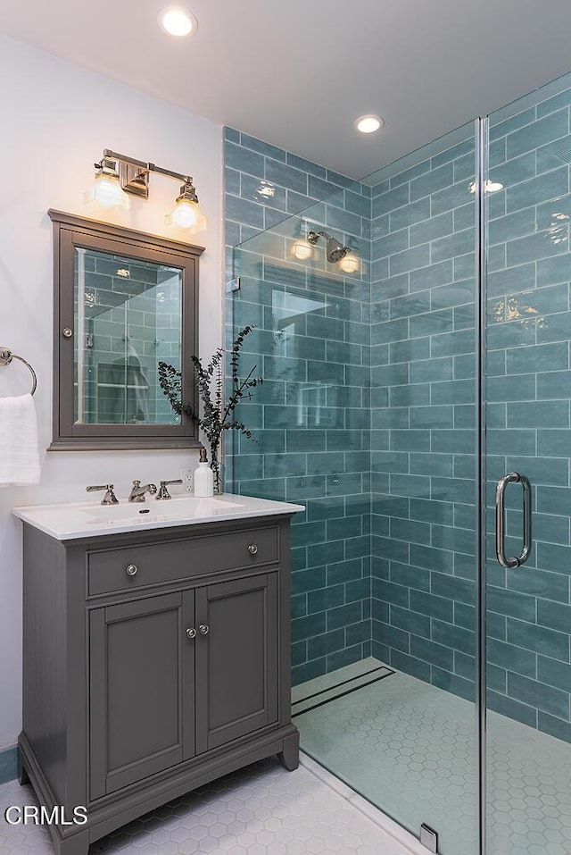 741 Burleigh Dr, Pasadena, CA 91105 - full bathroom with a stall shower, tile patterned flooring, recessed lighting, and vanity